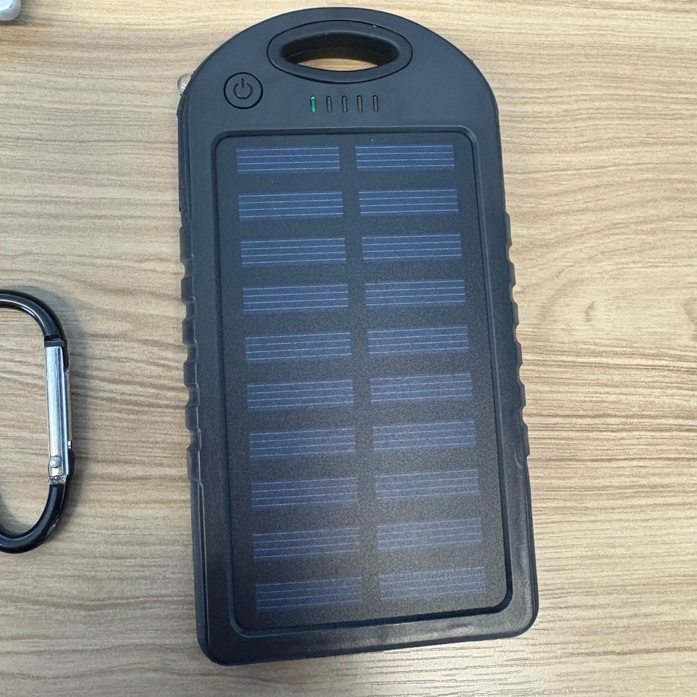 UNUSED APC Solar Portable Charger - 4000mAh Capacity